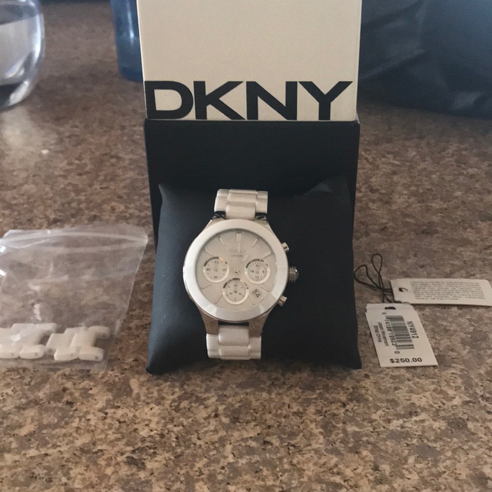 New.. tags taken off but I it’s.. white DKNY watch